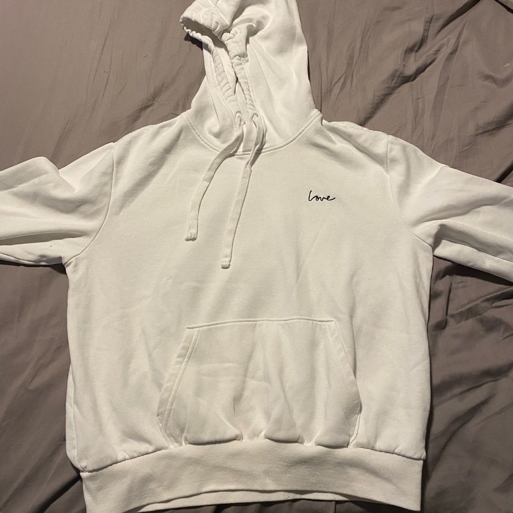 White small H & M hoodie with "love" enbroidered